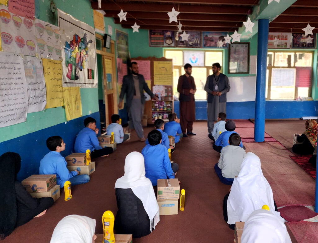 Gate of Hope volunteers distributing aid to Afghan families